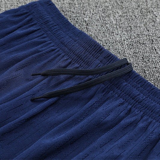 25/26 FC Barcelona Half Zip Training Blue/Purple Tracksuit from FootballPrestige.com - Premium Football Kits