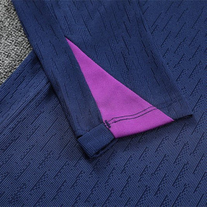 25/26 FC Barcelona Half Zip Training Blue/Purple Tracksuit from FootballPrestige.com - Premium Football Kits