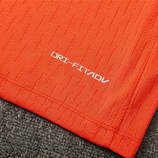 25/26 FC Barcelona Training Orange/Blue Tracksuit from FootballPrestige.com - Premium Football Kits