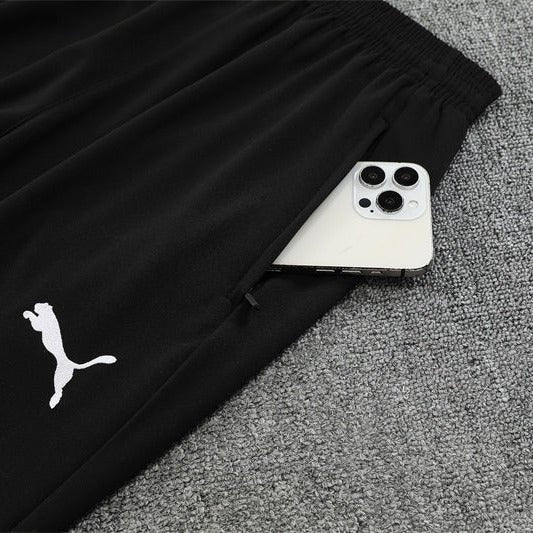 25/26 Manchester City x Asahi Black Tracksuit from FootballPrestige.com - Premium Football Kits
