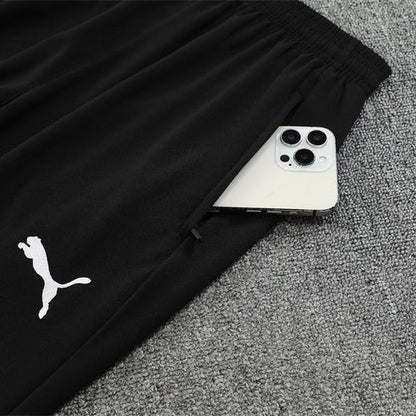25/26 Manchester City x Asahi Black Tracksuit from FootballPrestige.com - Premium Football Kits