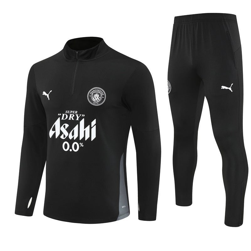 25/26 Manchester City x Asahi Black Tracksuit from FootballPrestige.com - Premium Football Kits