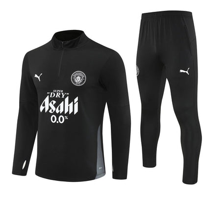 25/26 Manchester City x Asahi Black Tracksuit from FootballPrestige.com - Premium Football Kits