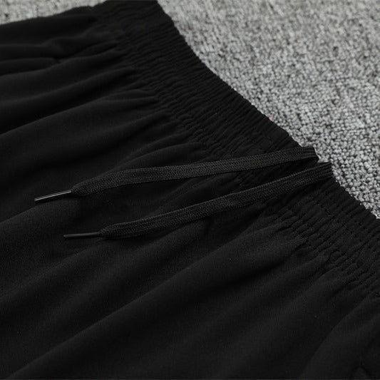 25/26 Manchester City x Asahi Black Tracksuit from FootballPrestige.com - Premium Football Kits