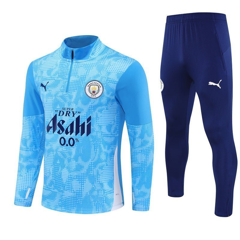 25/26 Manchester City x Asahi Blue Tracksuit from FootballPrestige.com - Premium Football Kits