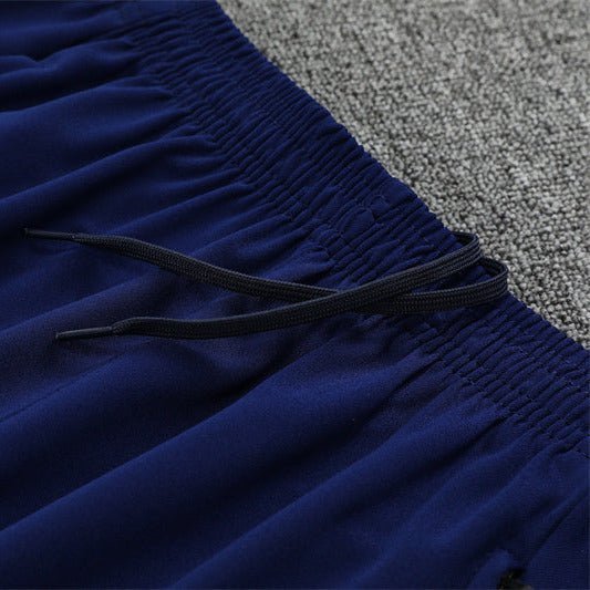 25/26 Manchester City x Asahi Blue Tracksuit from FootballPrestige.com - Premium Football Kits