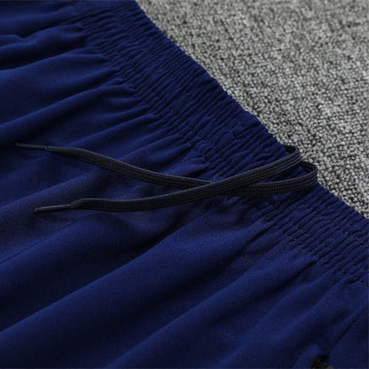 25/26 Manchester City x Asahi Blue Tracksuit from FootballPrestige.com - Premium Football Kits
