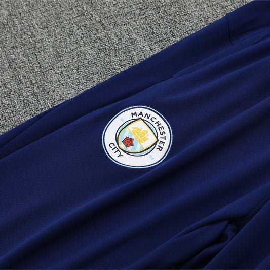 25/26 Manchester City x Asahi Blue Tracksuit from FootballPrestige.com - Premium Football Kits