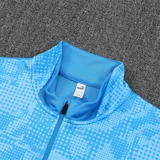 25/26 Manchester City x Asahi Blue Tracksuit from FootballPrestige.com - Premium Football Kits