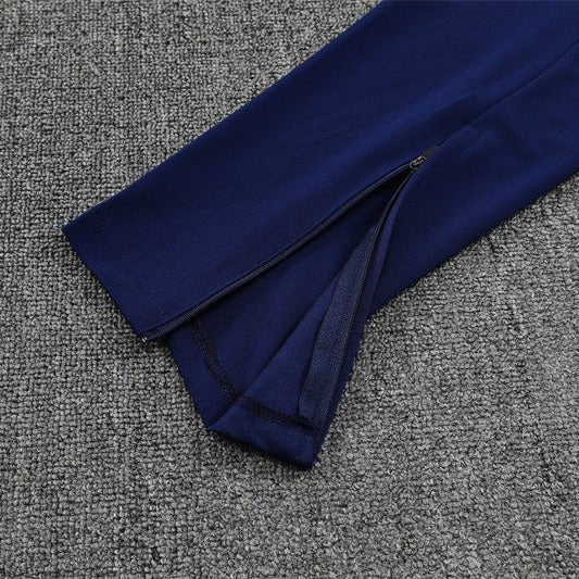 25/26 Manchester City x Asahi Blue Tracksuit from FootballPrestige.com - Premium Football Kits