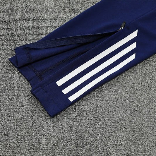 25/26 Real Madrid Training Blue Tracksuit from FootballPrestige.com - Premium Football Kits