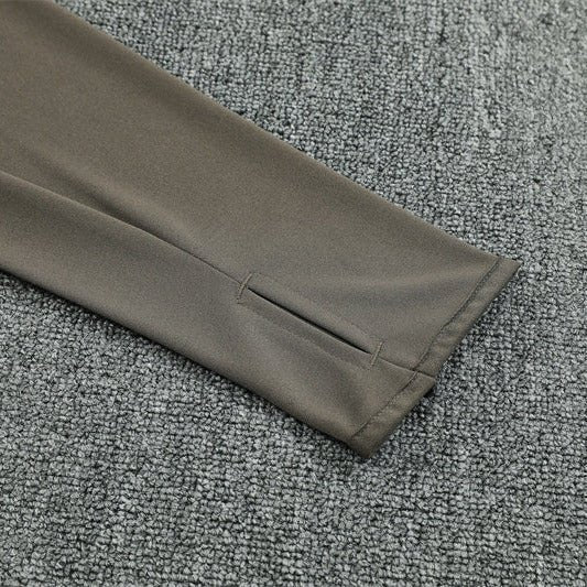25/26 Real Madrid Training Dark Olive Tracksuit from FootballPrestige.com - Premium Football Kits