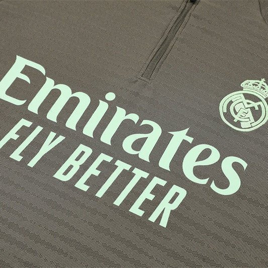 25/26 Real Madrid Training Dark Olive Tracksuit from FootballPrestige.com - Premium Football Kits