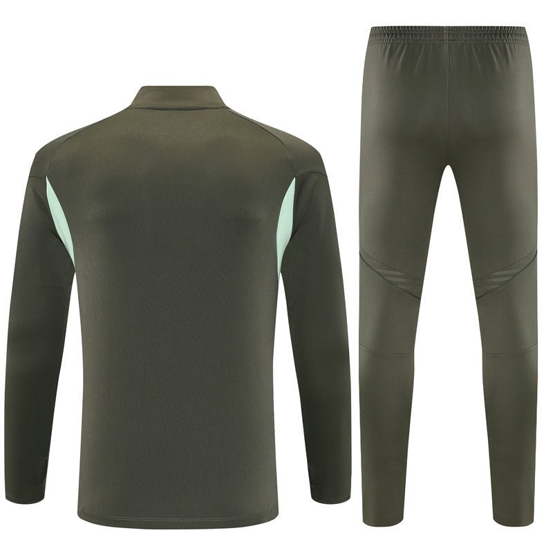 25/26 Real Madrid Training Dark Olive Tracksuit from FootballPrestige.com - Premium Football Kits