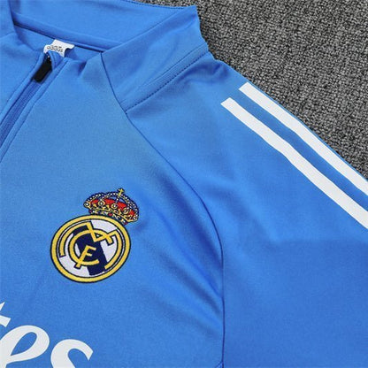 25/26 Real Madrid Training Light Blue Kids Size Tracksuit from FootballPrestige.com - Premium Football Kits