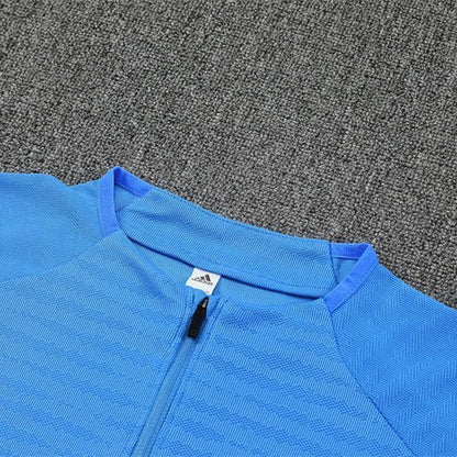 25/26 Real Madrid Training Light Blue Kids Size Tracksuit from FootballPrestige.com - Premium Football Kits