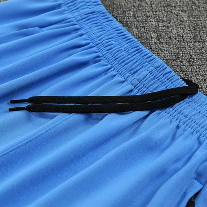 25/26 Real Madrid Training White/Light Blue Kids Size Tracksuit from FootballPrestige.com - Premium Football Kits