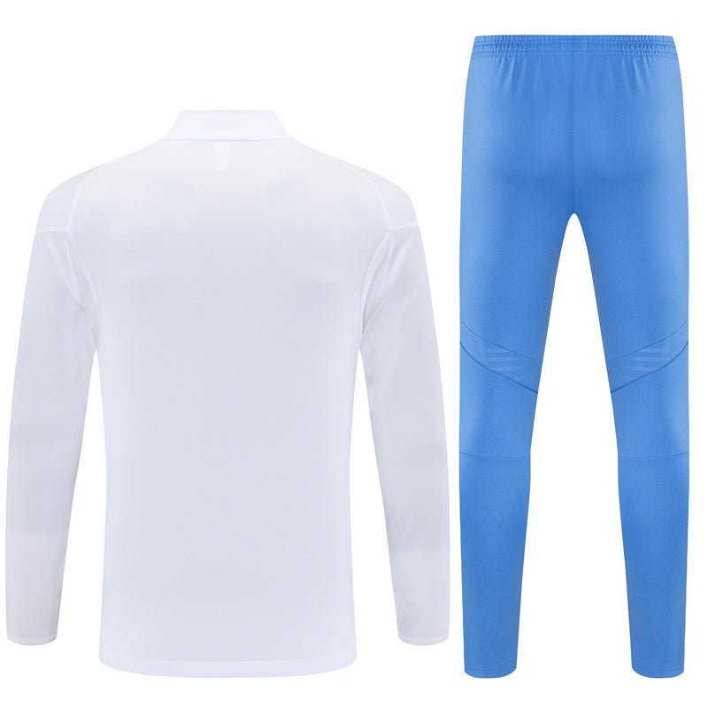 25/26 Real Madrid Training White/Light Blue Kids Size Tracksuit from FootballPrestige.com - Premium Football Kits