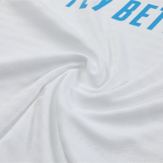 25/26 Real Madrid Training White/Light Blue Kids Size Tracksuit from FootballPrestige.com - Premium Football Kits