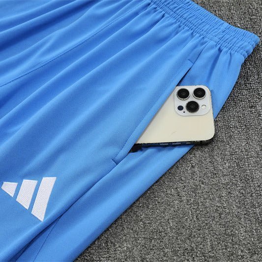 25/26 Real Madrid Training White/Light Blue Kids Size Tracksuit from FootballPrestige.com - Premium Football Kits