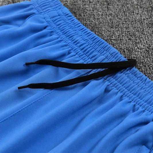 25/26 Real Madrid Training White/Light Blue Kids Size Tracksuit from FootballPrestige.com - Premium Football Kits
