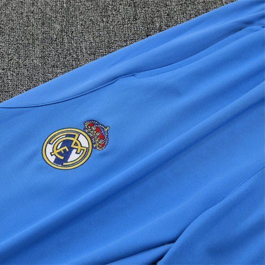 25/26 Real Madrid Training White/Light Blue Kids Size Tracksuit from FootballPrestige.com - Premium Football Kits