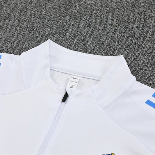25/26 Real Madrid Training White/Light Blue Tracksuit from FootballPrestige.com - Premium Football Kits