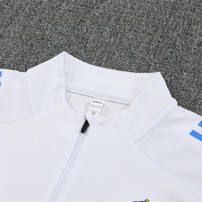 25/26 Real Madrid Training White/Light Blue Tracksuit from FootballPrestige.com - Premium Football Kits