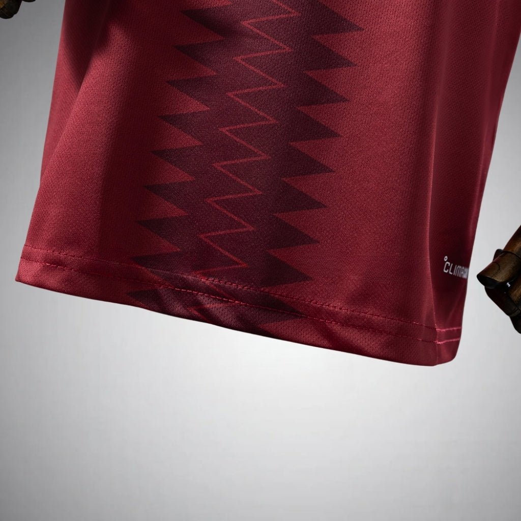 2026 Qatar Home Kids Size Kit from FootballPrestige.com - Premium Football Kits