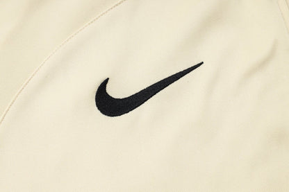 PSG Beige and Dark Blue Premium Tracksuit from FootballPrestige.shop - Premium Concept kits