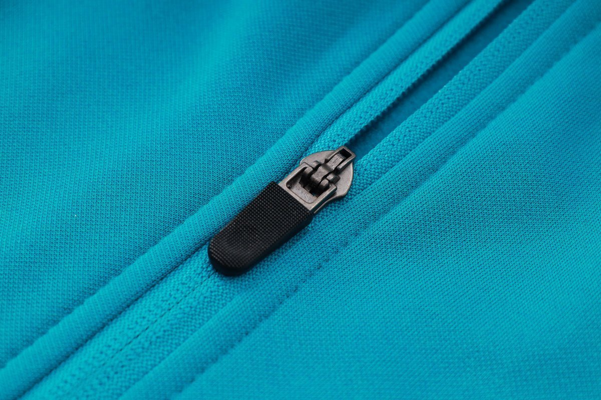 PSG Turquoise and Pink Premium Tracksuit from FootballPrestige.shop - Premium Concept kits