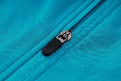 PSG Turquoise and Pink Premium Tracksuit from FootballPrestige.shop - Premium Concept kits