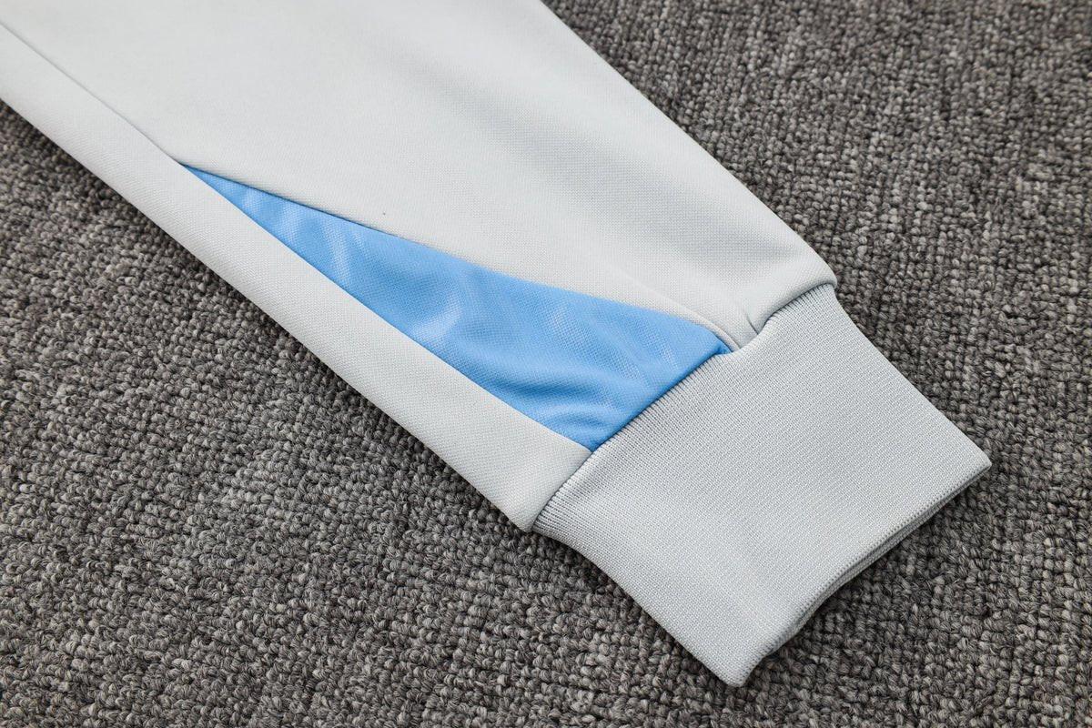 PSG White and Blue Premium Tracksuit from FootballPrestige.shop - Premium Concept kits