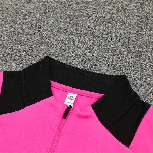 Real Madrid "Aurora Rose" Premium Kids Size Tracksuit from FootballPrestige.com - Premium Football Kits