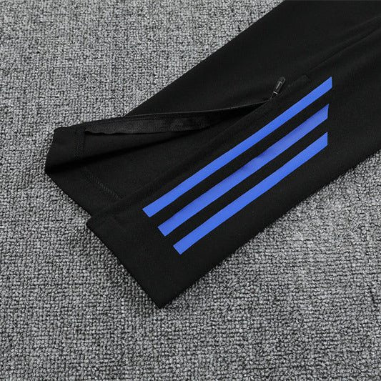 Real Madrid "Azul Reactor" Premium Kids Size Tracksuit from FootballPrestige.com - Premium Football Kits