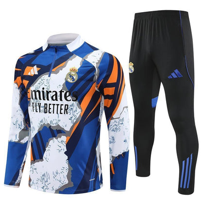 Real Madrid "Azul Reactor" Premium Kids Size Tracksuit from FootballPrestige.com - Premium Football Kits
