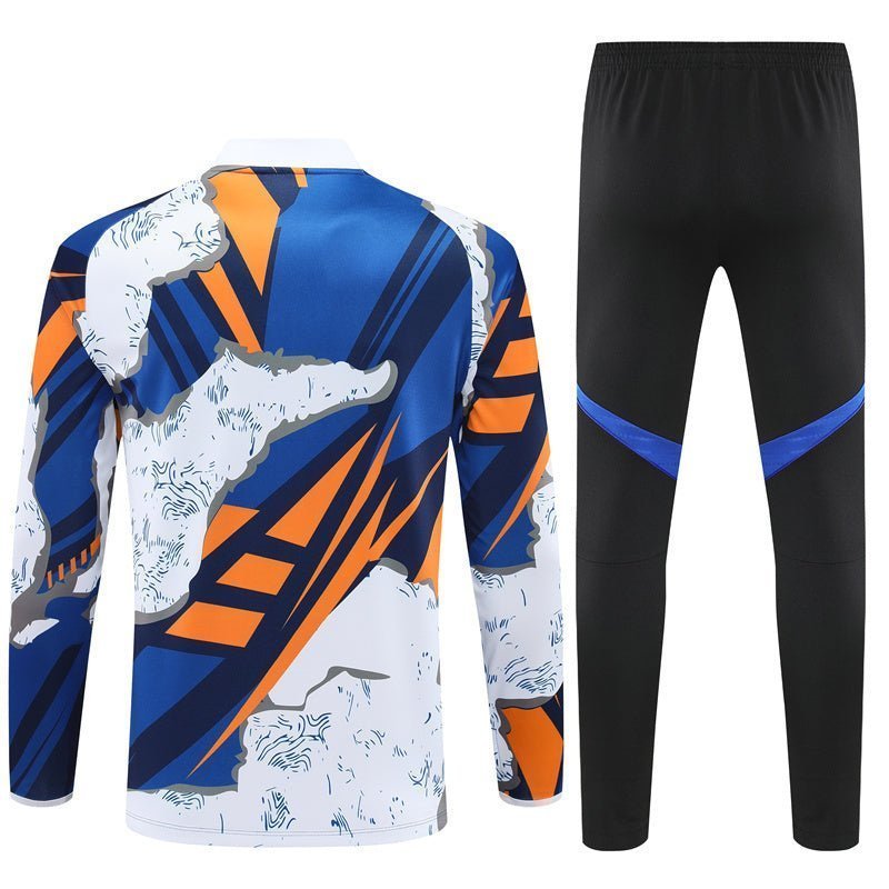 Real Madrid "Azul Reactor" Premium Kids Size Tracksuit from FootballPrestige.com - Premium Football Kits