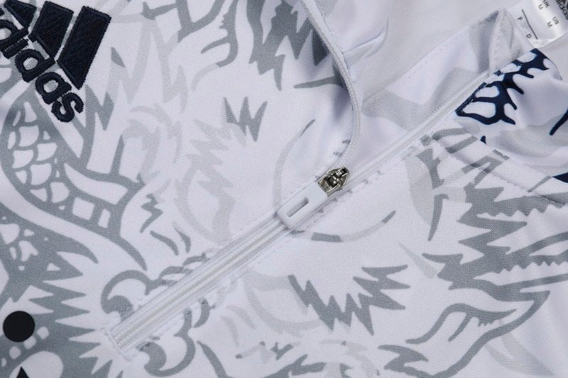 Real Madrid "Dragón Blanco" Premium Tracksuit from FootballPrestige.club - Premium Football Kits
