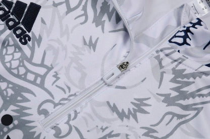 Real Madrid "Dragón Blanco" Premium Tracksuit from FootballPrestige.com - Premium Football Kits