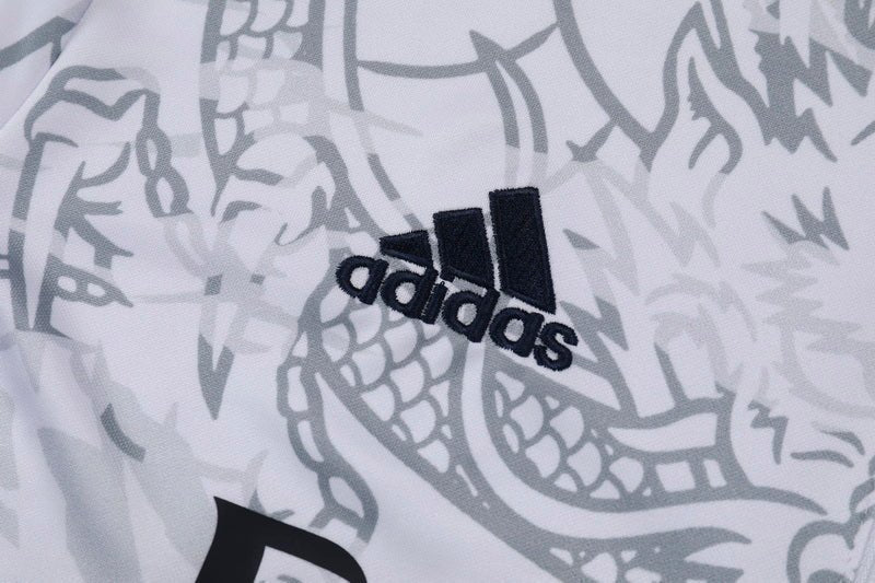 Real Madrid "Dragón Blanco" Premium Tracksuit from FootballPrestige.com - Premium Football Kits
