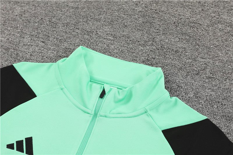 Real Madrid "Emerald Phase" Premium Tracksuit from FootballPrestige.club - Premium Football Kits