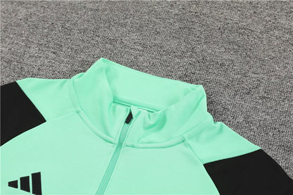Real Madrid "Emerald Phase" Premium Tracksuit from FootballPrestige.com - Premium Football Kits