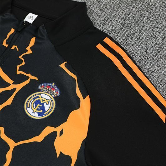 Real Madrid "Eruption" Premium Kids Size Tracksuit from FootballPrestige.com - Premium Football Kits