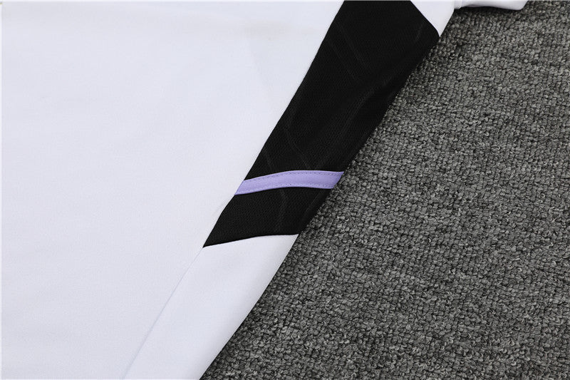 Real Madrid "Momentum" Premium Tracksuit from FootballPrestige.club - Premium Football Kits