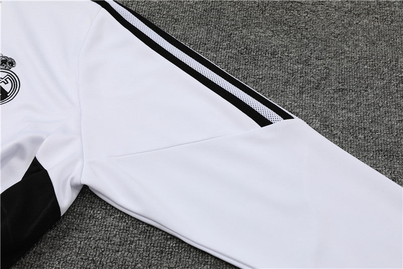 Real Madrid "Momentum" Premium Tracksuit from FootballPrestige.com - Premium Football Kits