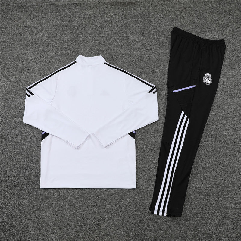 Real Madrid "Momentum" Premium Tracksuit from FootballPrestige.club - Premium Football Kits