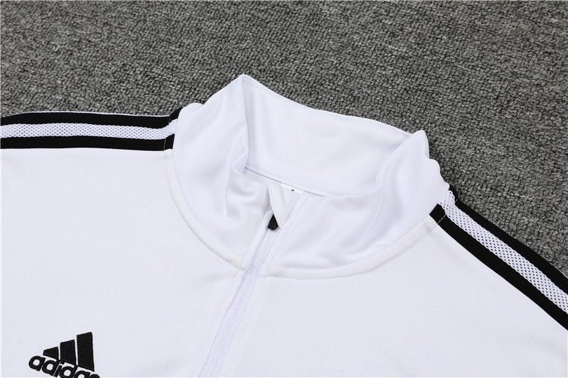 Real Madrid "Momentum" Premium Tracksuit from FootballPrestige.club - Premium Football Kits