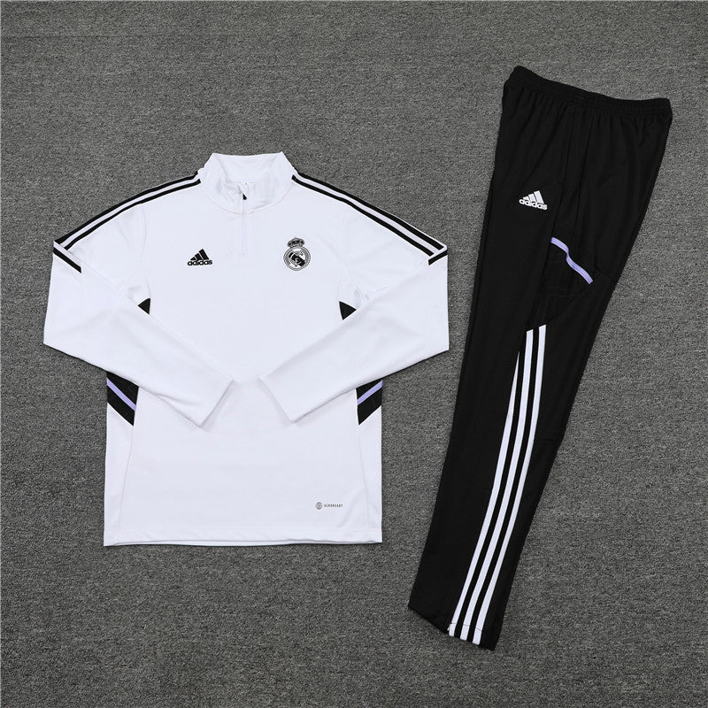 Real Madrid "Momentum" Premium Tracksuit from FootballPrestige.club - Premium Football Kits