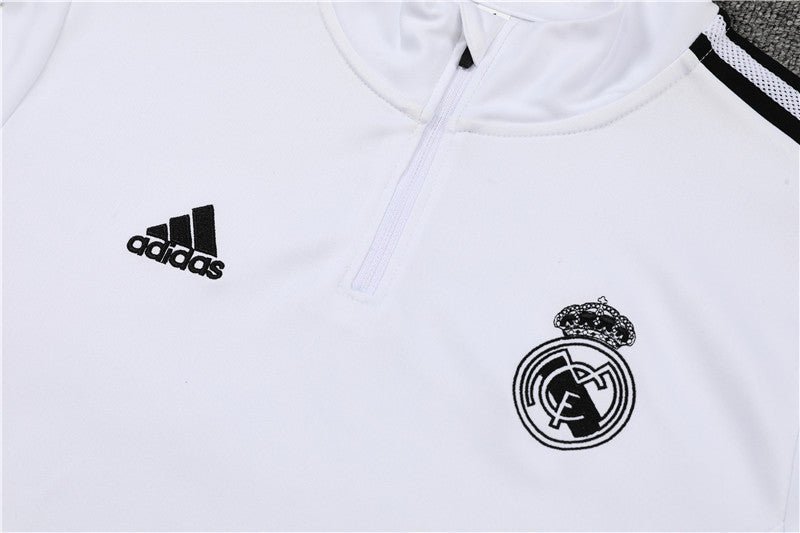 Real Madrid "Momentum" Premium Tracksuit from FootballPrestige.com - Premium Football Kits